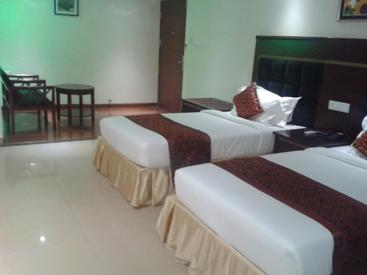 Hotel Hiton Perintalmanna Rum bild